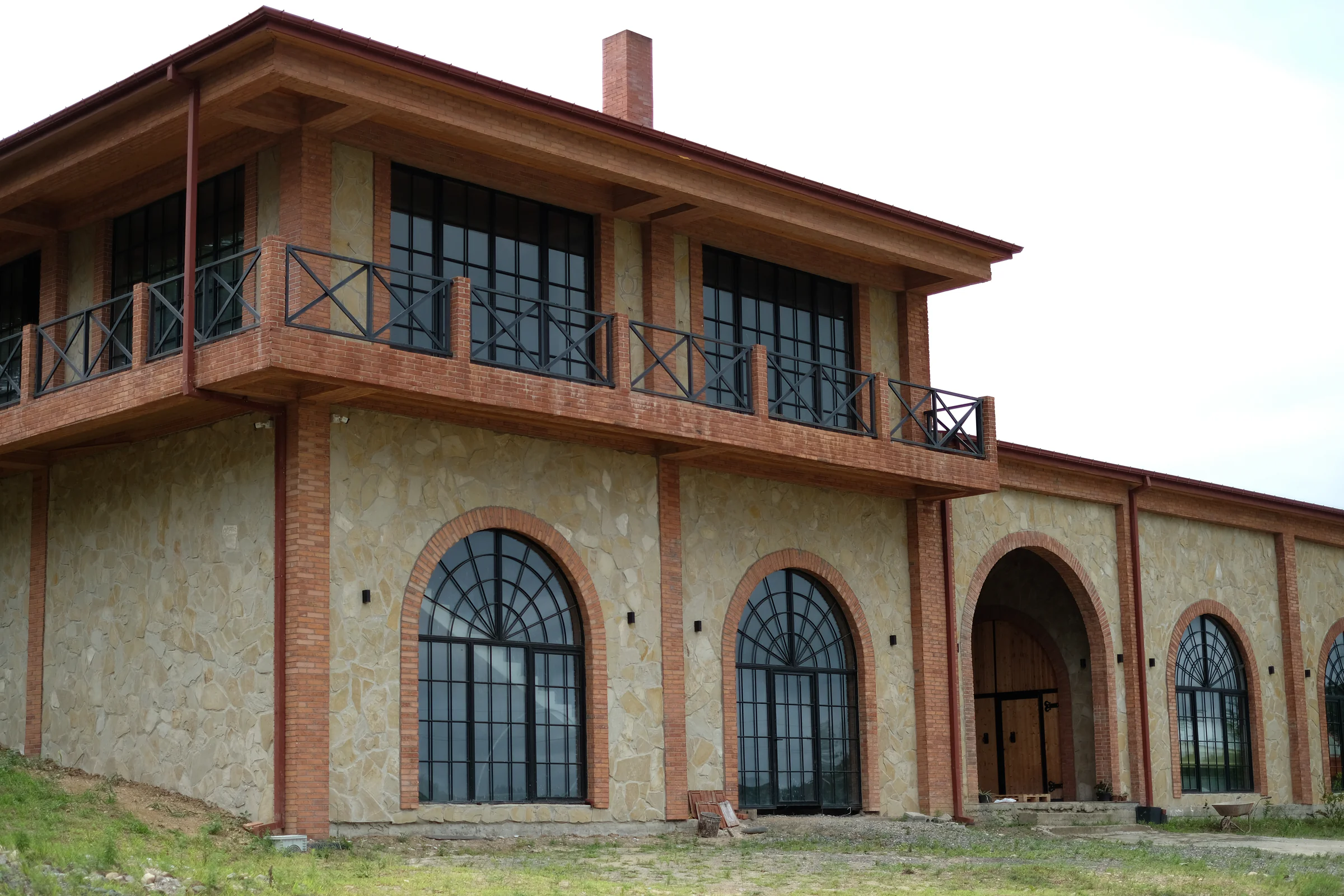 The brick-and-stone exterior of the family's new building.